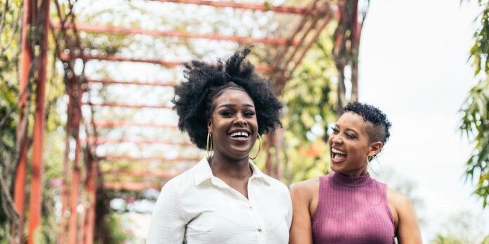 women-stylish-friends-having-fun-walking-in-a-park.jpg